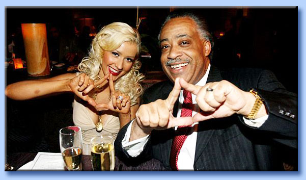 al sharpton - christina aguilera - triangolo